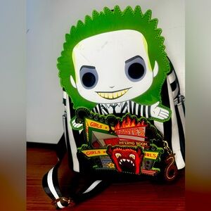 Funko! Pop Beetlejuice glow in the dark backpack.